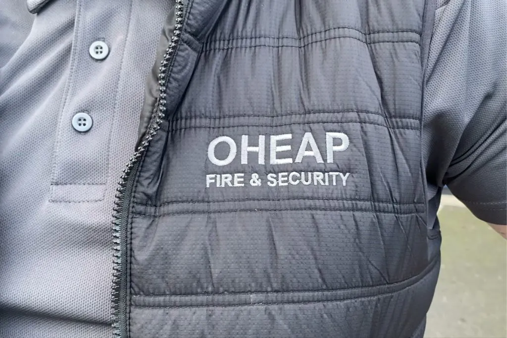 An embroidered logo on a jacket