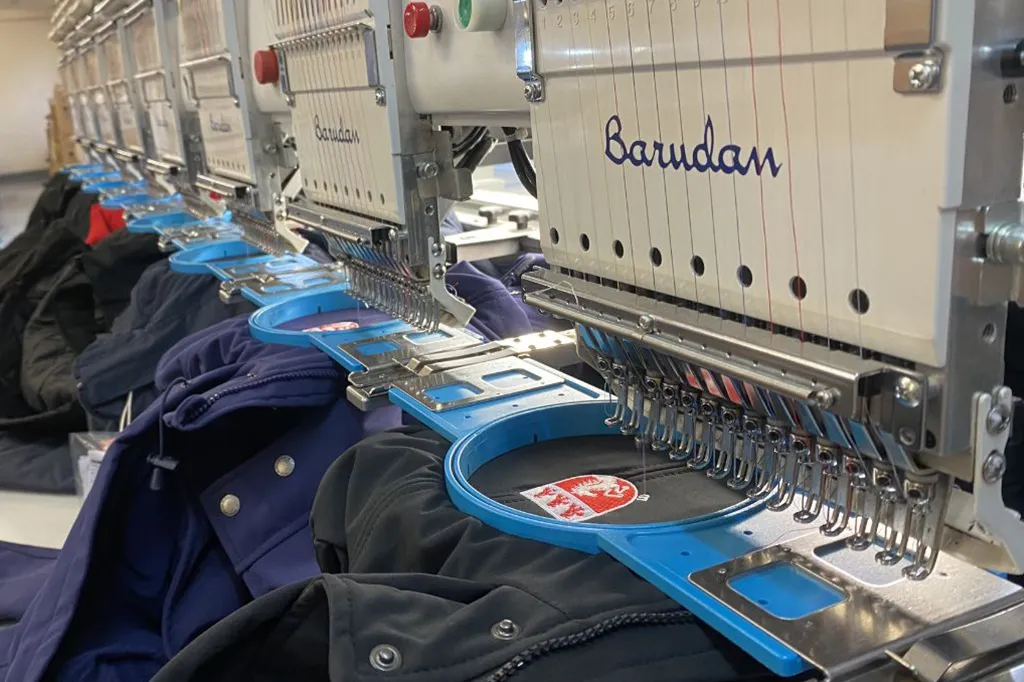 Embroidered workwear being embroidered