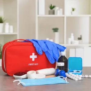 A first aid kit on a counter top