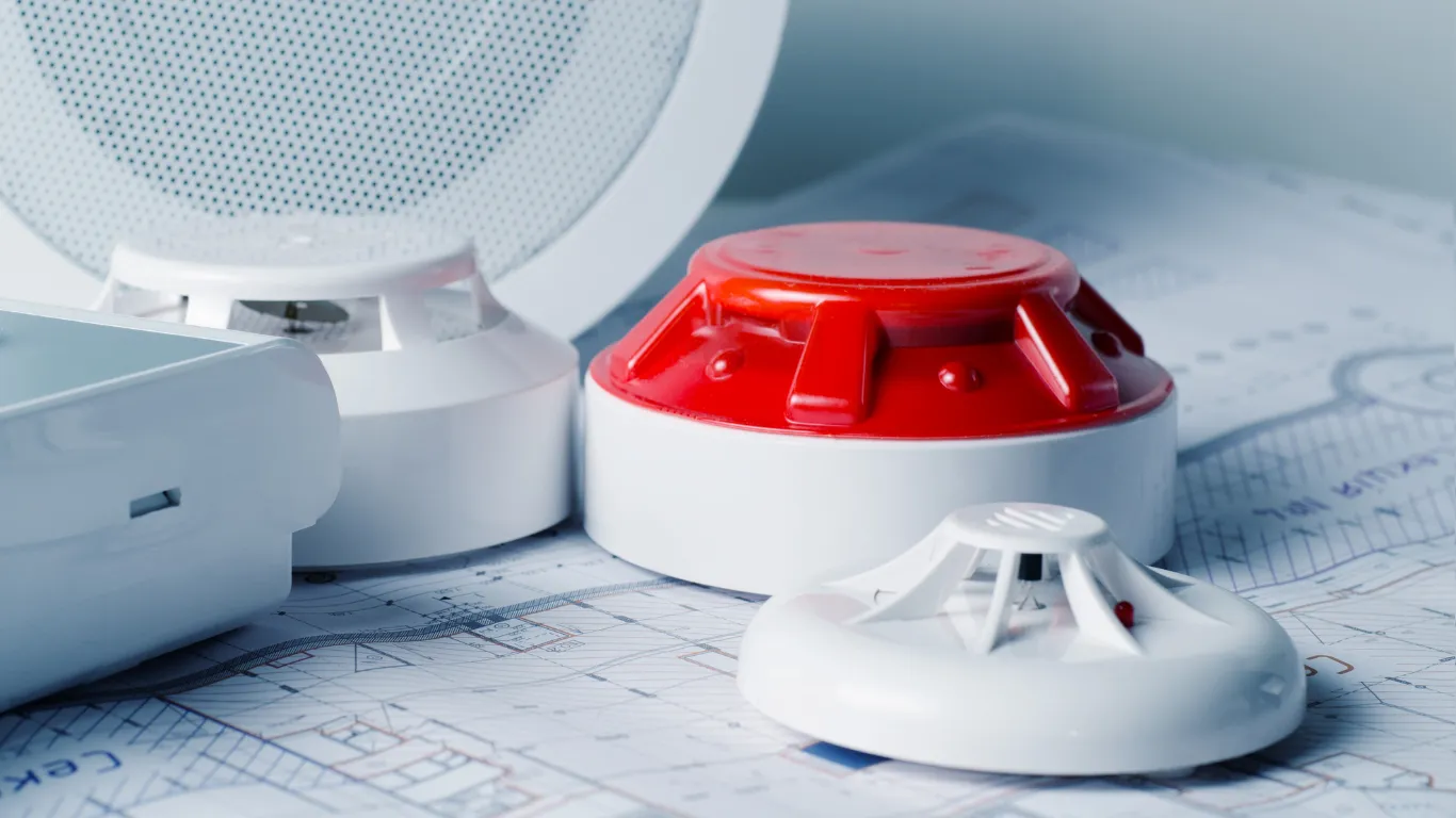 A fire alarm, heat alarm and smoke detector